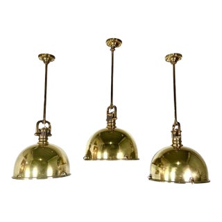 Set of Three Monumental Brass Domed Shaped Pendants For Sale