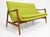Mid-century-style sofa. The sofa was made in the style of Ib Kofod-Larsen. The sofa is stained a light walnut, matte...
