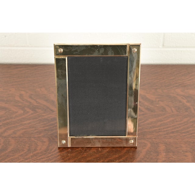A gorgeous modern Art Deco silver plate picture frame By Ralph Lauren USA, Circa Late 20th Century Measures: 6.75"W x...