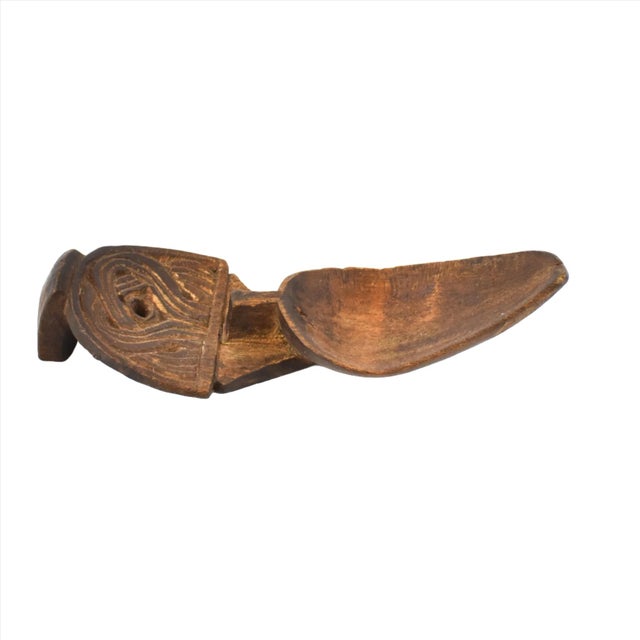 Beautifully carved Oromo wood spoon from Ethiopia.Â The Oromo people are an ethnic group primarily located in Ethiopia,...