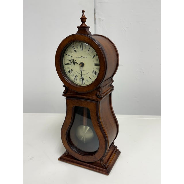 Design Plus Gallery presents the Arendal 80th Anniversary Edition Mantel Clock from Howard Miller. This model has a...