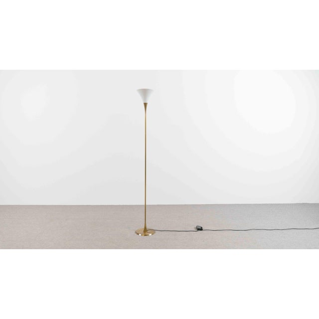 Add a touch of style to your living space with the elegant "Lonea" floor lamp by Florian Schulz. The high-quality, warm...
