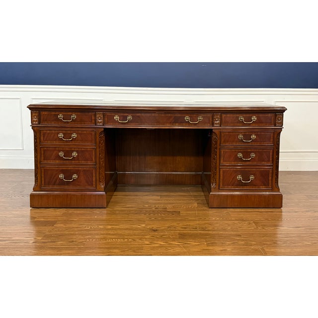 This is a Traditional Mahogany Credenza by Leighton Hall. It features swirly crotch mahogany panels on the top, sides,...