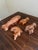 A charming collection of four vintage copper molds featuring fish and lobster forms, each retaining the warm glow and...