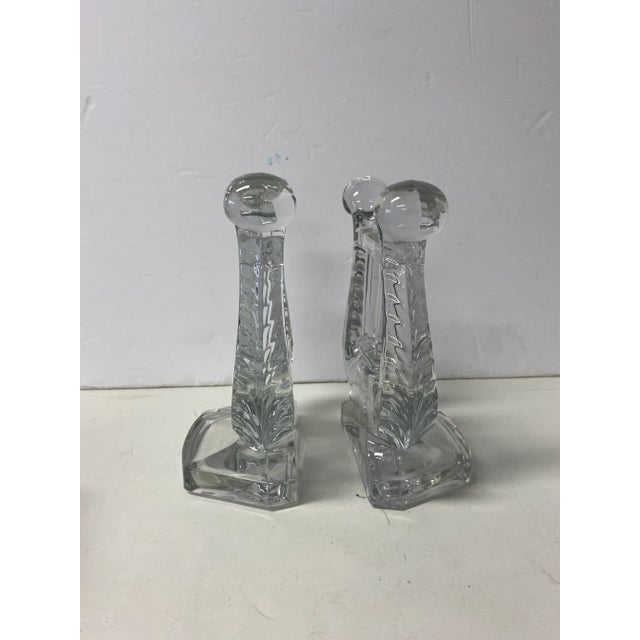 Beautiful pair of clear glass bookends in the shape of a lyre. Perfect for that music lover or book collector