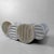A Japanese ikebana vase with a low, elongated form and softly speckled glaze. Dimensions: height 12 cm, width 12 cm,...