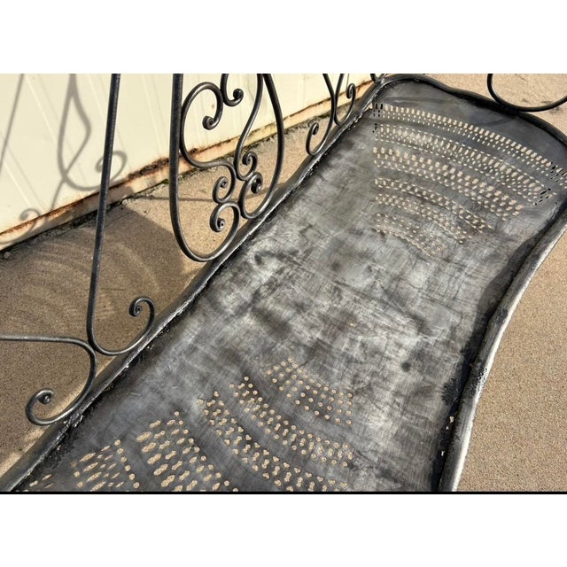 Wrought iron bench, restored, stripped and varnished.