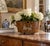 A handsome late 20th-century tole cachepot finished in a richly mottled faux bois pattern, giving the metal surface the...