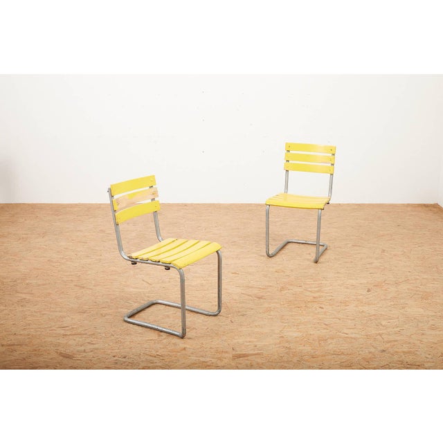 Stackable Yellow Model 1023 Garden Chair Set in Galvanized Steel Tubing and Wooden Slats by Embru, 1934, Set of 2, in Good...