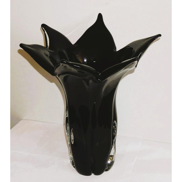 Handkerchief-shaped vase in black Murano glass. Vintage Black glass vase, made by a master glassmaker in Murano around the...