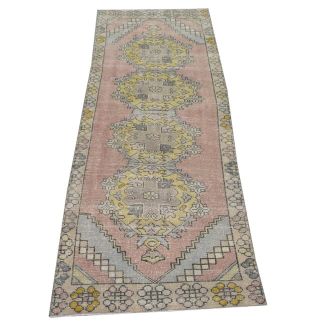 Hand-knotted with care using traditional rug making techniques, this wool rug blends timeless craftsmanship with a modern...