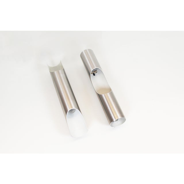 Well-known set of two 'fuga' wall lamps by the dutch company raak. One of the most famous and iconic models from the raak...