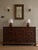 A late 17th-century English oak geometric chest from the Charles II / Jacobean period, with a rich dark patina and...
