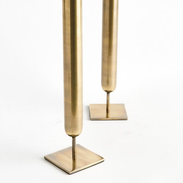 These tall, slender iron vases really bring the drama. Finished in an antique brass, they are perfect for that singular,...
