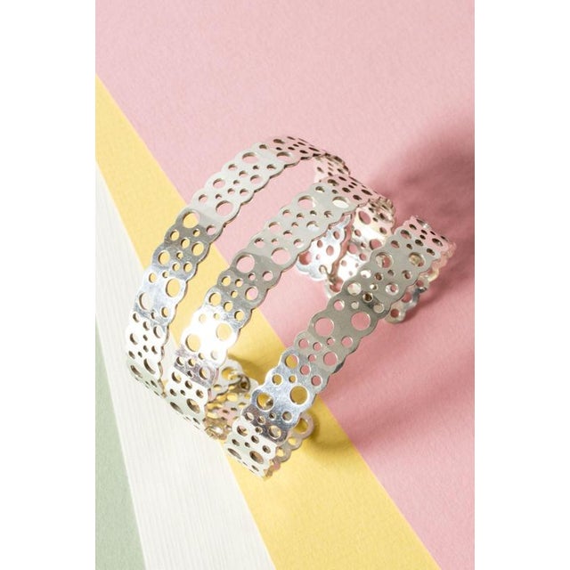 Beautiful silver "Pitsi" bracelet by Liisa Vitali, “Pitsi” means lace. Cuff split into three pieces that are linked...