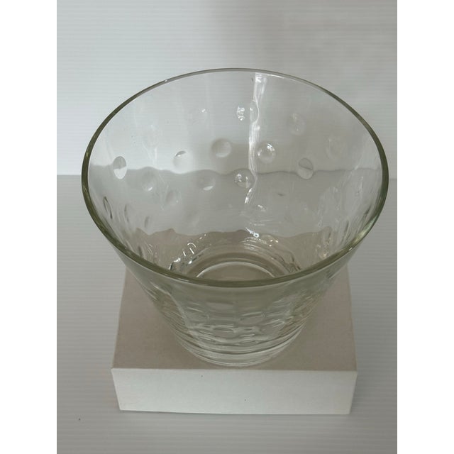 This mid-century hand-blown art glass bowl showcases a sculptural optic bubble pattern created through controlled air...