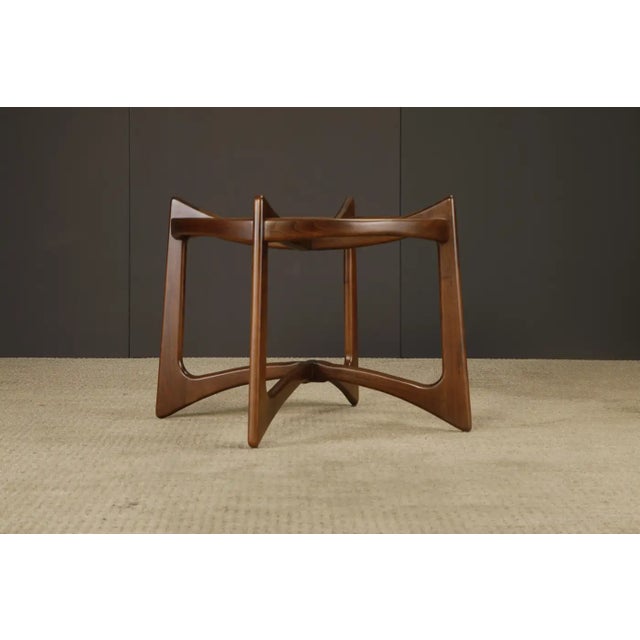A striking example of Adrian Pearsall’s sculptural design language, this 'Compass' dining table (Model 2458-T48) was...