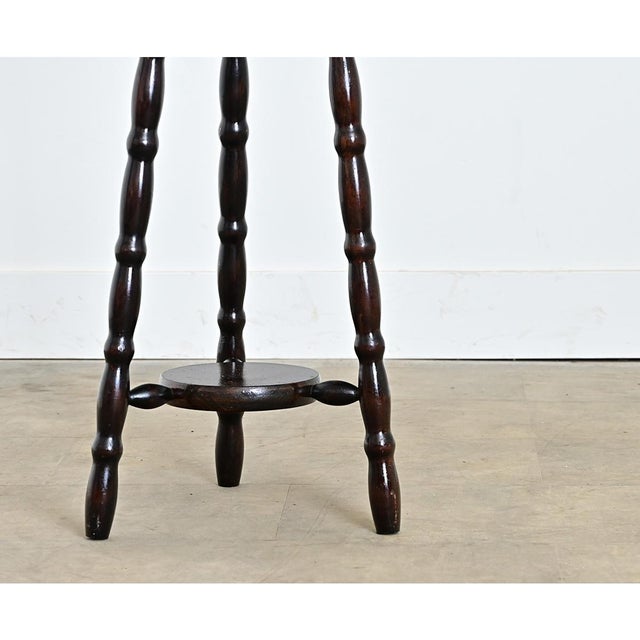 English late 19th century bobbin-turned pedestal/bar stool in deep mahogany tone that becomes a charming and versatile...