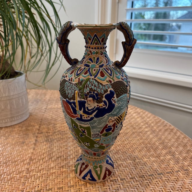 Lovely antique Japanese Moriage Satsuma pottery vase featuring the intricate glazed and enameled designs the genre is...