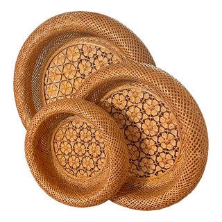 Vintage Intricately Woven Rattan Nesting Baskets, Set of 3 For Sale