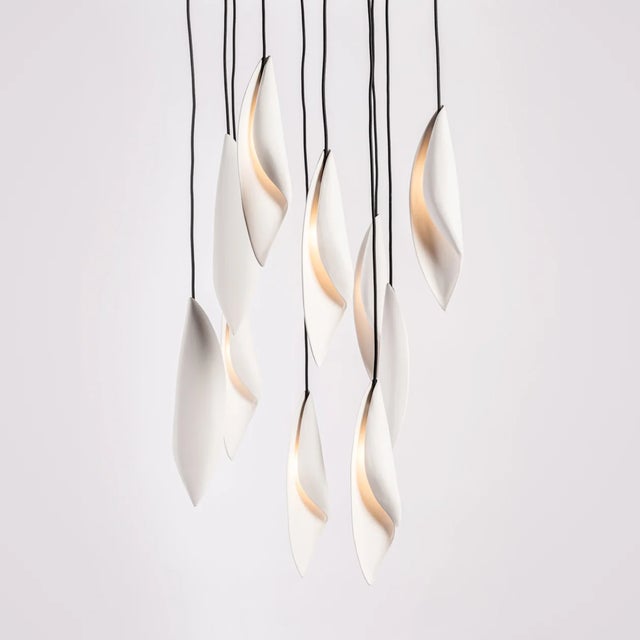 Simple and chic, reminiscent of natural forms, the Leaf Chandelier is made by the most skilled Italian craftsmen entirely...