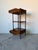 Beautiful 1970’s vintage three-tier etagere by Mount Airy Furniture Company, crafted in rich walnut with elegant faux...