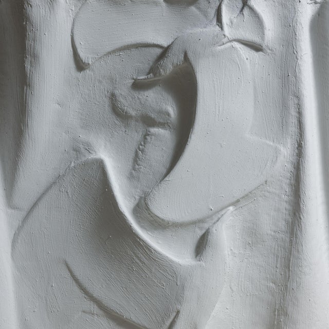 Dining table with clear tempered glass top, pair of hand-embossed copper bases painted with water base and gypsum color,...