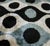 "Bold geometry meets artisanal craftsmanship in this striking handmade silk velvet throw pillow. Showcasing an oversized...