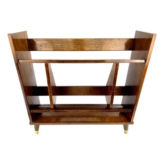 Vintage Mid-Century Modern Wood Bookcase With Brass-Capped Feet For Sale