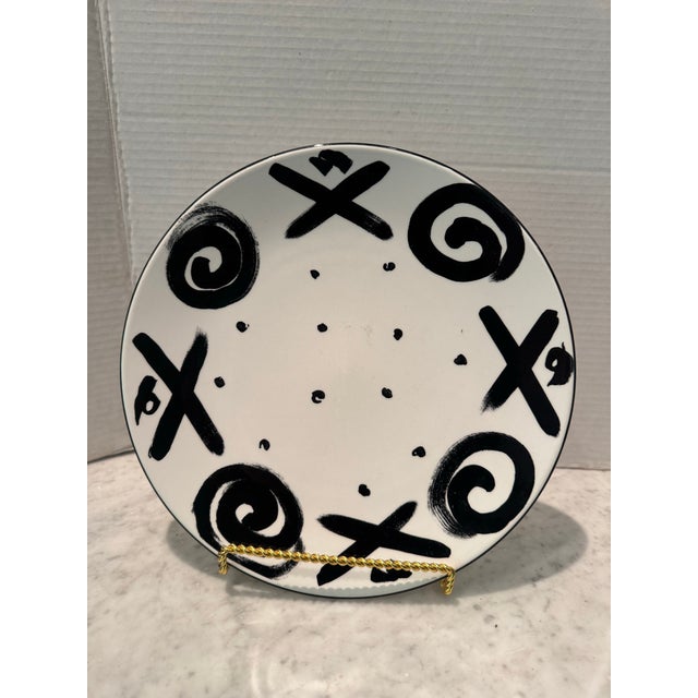 A vintage set of Mikasa dinnerware in the Reggae pattern. The Reggae pattern was manufactured in between 1995 and 1998....