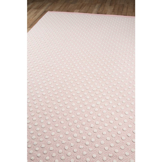 COZY VIBE: A pastel color palette and plush fibers make this rug a perfect floorcovering for rooms seeking a soft...
