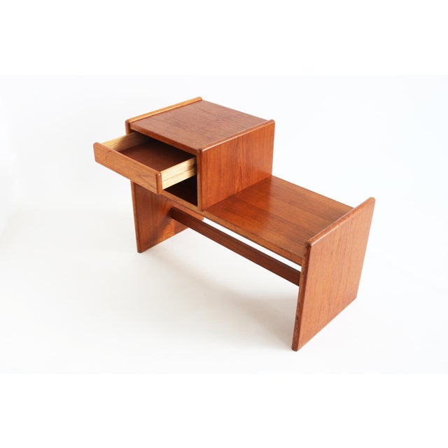 Original Danish hall bench from the 1960s, produced by Bornholm Møbelfabrik. This piece features clean lines and a...