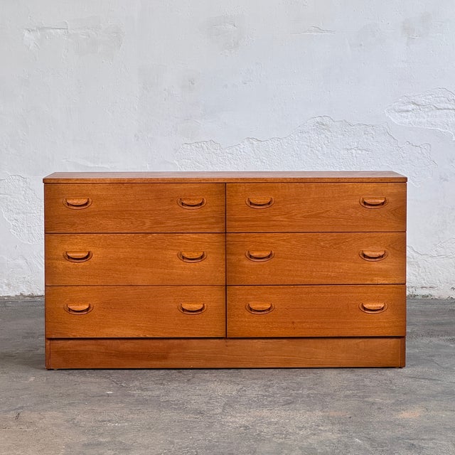 This mid-century sideboard is a beautiful example of Scandinavian-inspired minimalist design from the 1960s. Crafted from...