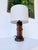Vintage lamp with a hand-carved solid oak base in a brutalist style, dating from the 1950s. entirely handcrafted and...