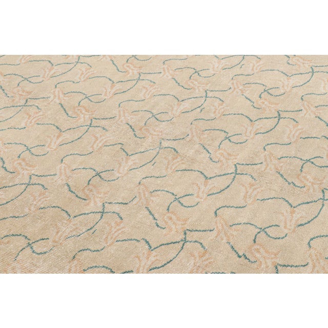 Hand-knotted in wool and originating from Turkey circa 1960 – 1970, this 5x7 vintage Zeki Müren rug is a unique addition...