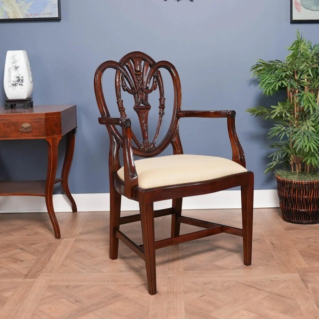 This Set of 10 Carved Shield Back Chairs by Niagara Furniture are slightly larger and heavier than some of our other...