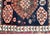 A beautiful early 20th century Persian Qashqai rug with a central stylized floral medallion amidst a field of even more...