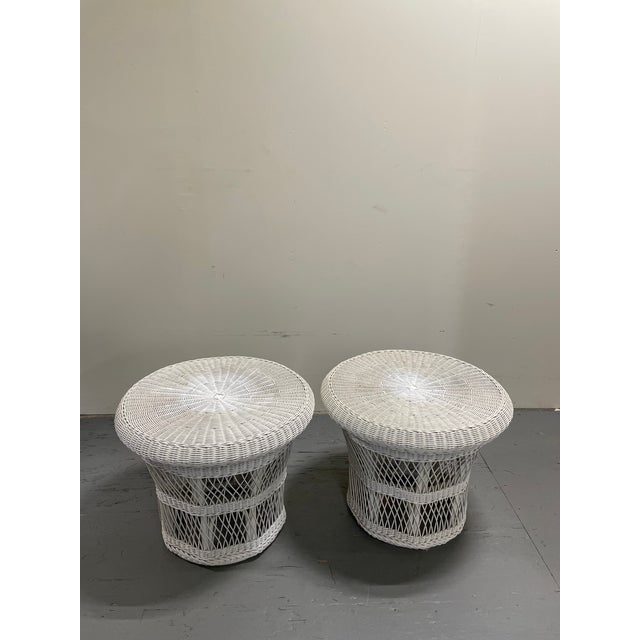 Vintage wicker side tables with removable tray top. Classic and timeless. Solid wicker construction with ample storage and...