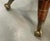 Vintage 1990s Bamboo Chippendale Dining table with claw foot legs. 48" diameter beveled glass top. It crosses stylistic...