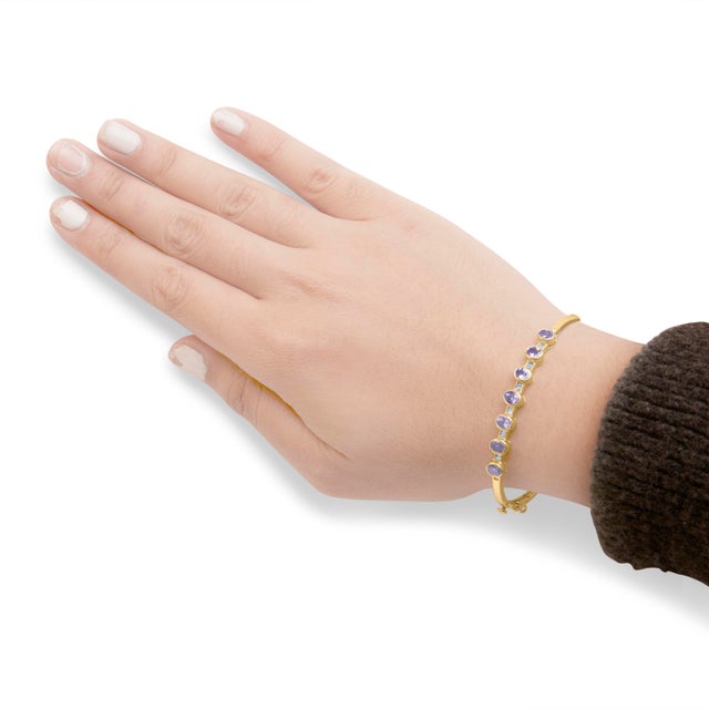 14K Yellow Gold Alternating Bezel Set 5MM Oval Shaped Tanzanite and 1/5 Cttw Diamond Bangle Bracelet - Fit's wrists up to 7.25" For Sale - Image 4 of 5