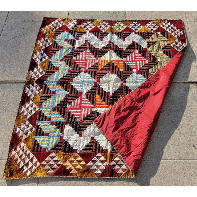 This amazing log cabin / barn raising silk & velvet quilt is in amazing mint condition. This comes to us from a private...