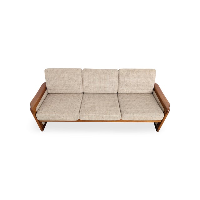 We are offering a beautiful vintage three-seater sofa from the renowned Danish manufacturer Dyrlund for sale. The piece is...