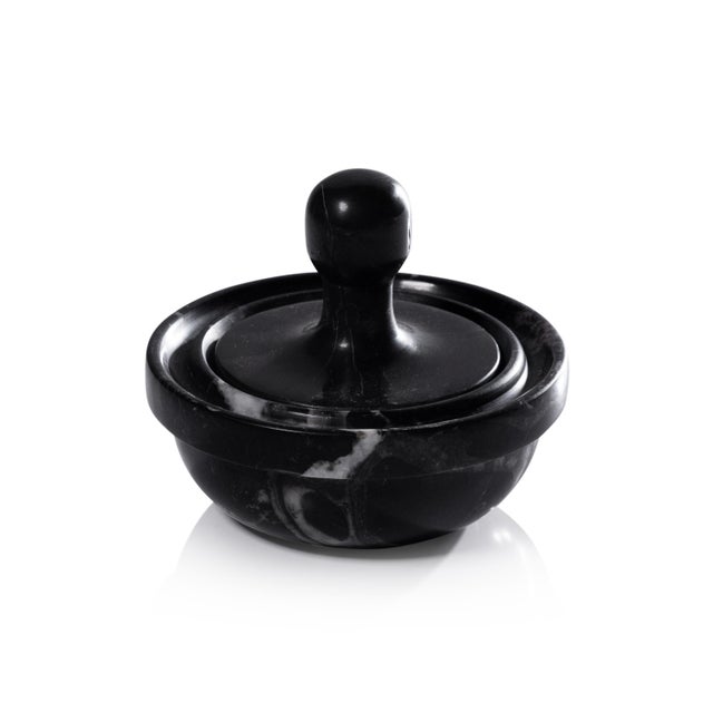 The Marble Spice Grinder is a refined take on a kitchen essential, combining functionality with sculptural elegance....