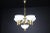 Sculptural italian chandelier in brass & white opaline glass, 1970s – 12 available elegant and structurally bold, this...