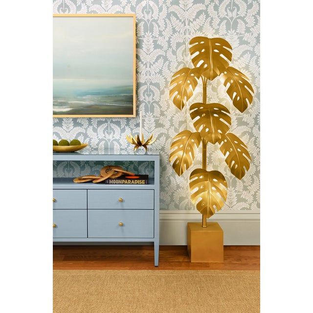 New special order item. Not vintage. Bring the tropical outdoors indoors with the Iggy Monstera Tree Floor Lamp, a...