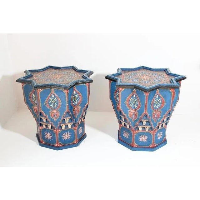 Pair of Moroccan colorful blue hand painted and carved side occasional table with Moorish Islamic designs. Vintage...