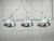 Rare large-scale adjustable three-light chandelier by a.l.f. Firenze, manufactured in italy during the 1970s. An...