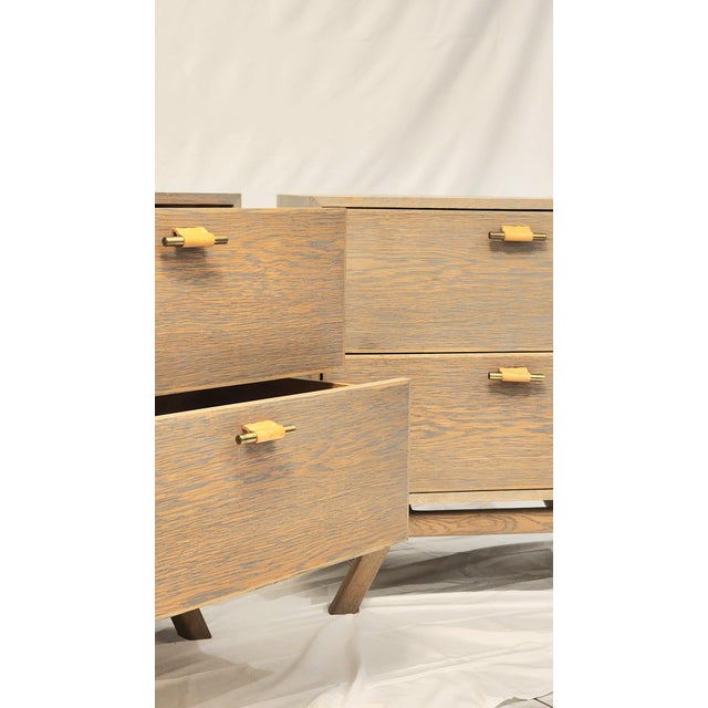 The Murphy Side Table Like New Dimensions: 28"W x 19"D x 29"H Metal: Brass - Light Patina Wood: Oak - Gray Oil Leather:...