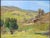A beautiful original landscape painting by listed artist Felice Hrovat, depicting a sunlit rolling hillside with scattered...