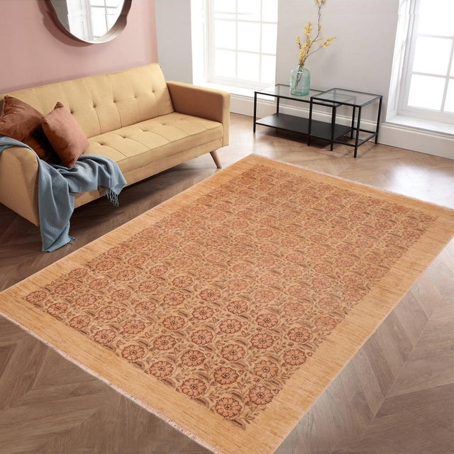 "Enhance the ambiance of your home with this magnificent Persian-influenced Turkish hand-knotted rug made by skilled...